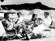 Disney brothers and wives 1.png (191 KB) Roy O., Edna, Lillian, and Walt Disney are seen on the beach in Waikiki while they were vacationing in Hawaii in 1939.