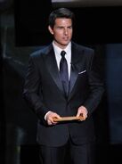 Tom Cruise speaks onstage at the 84th annual Academy Awards in February 2012.