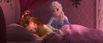 Elsa looks over her sleeping sister