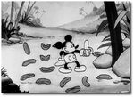 Mickey eating bananas