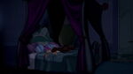 Belle crying on her bed.