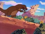 A T. rex attacking a baby Hadrosaurus in the DuckTales episode "Dinosaur Ducks"