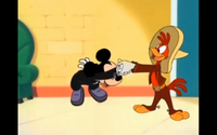 Panchito excitedly shakes Mickey's hand.