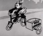 Ortensia aka Sadie on her bicycle selling "box lunches" in the short "Sky Scrappers"