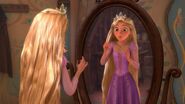 Rapunzel wearing it (again) while looking at herself in the mirror