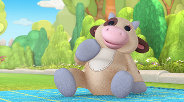 The cow goes moo toy top