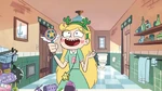Star tries on a cactus headband