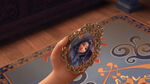 Evie tells her magic mirror not to be jealous