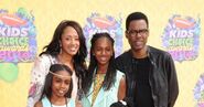 Chris Rock and his wife Malaak Compton-Rock with their daughters Zahra and Lola attending the 2014 Nickelodeon Kids' Choice Awards.