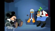 Mickey Donald and Goofy looking sad