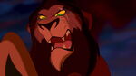 Scar about to grab Simba's paws with his claws like he did to Mufasa