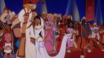Mamood looks at Aladdin and Jasmine as they walk out of the palace.