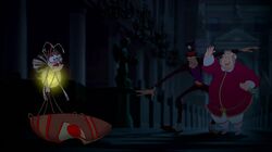 Ray evading Facilier and Lawrence with the talisman.