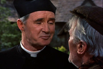 Father Murphy playing a small battle of wits with Darby