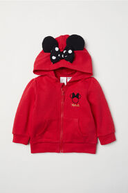Chaqueta en tejido sudadera con capucha forrada en punto de H&M.