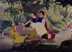 The Forest Animals and Dwarfs celebrate Snow White's awakening.