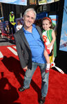 Carlos Alazraqui with his daughter, Rylee, at the premiere of Planes in August 2013.