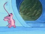 Angel closing the doors of a ship, thus trapping Stitch