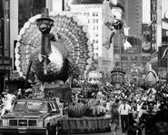 The Toy Turkey float with the Donald Duck balloon behind it from 1984. Donald returned in 1984 to celebrate his 50th Anniversary.