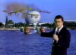 Regis Philbin hosting Epcot's Spaceship Earth at the Disney Christmas parade.