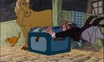 Frou-Frou blocks Edgar from moving the trunk any further.