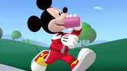 Mickey drinking while running