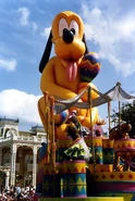 Pluto w Maracas.jpg (41 KB) Pluto with a pair of maracas