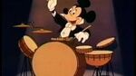 Mickey playing drums