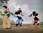 Minnie introducing Mortimer to an irate Mickey.