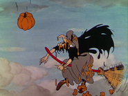 The witch having pumpkins thrown at her