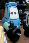 Guido in front of the Cars Race Rally attraction at Walt Disney Studios Park in France.