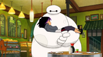 Baymax carries a sleeping Go Go