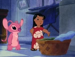Lilo making Angel sleep in a basket