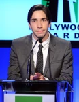 Justin Long speaks onstage at the 14th annual Hollywood Film Awards in October 2010.