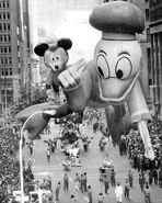 Donald Duck marks his farewell from the parade after almost eleven years in the 1972 parade, being joined by Mickey Mouse and a selection of other Disney floats and characters to celebrate the Walt Disney World Resort's first anniversary.