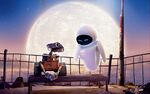 WALL-E and EVE sitting in front of the moonlight