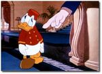 The hotel manager scolds Donald.