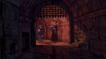 Frollo and a guard in the palace prison