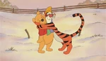 Tigger hugging Pooh Bear