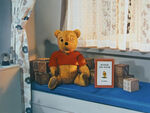 Winnie the Pooh is a real stuffed bear who winked at us