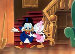 Webby kisses Scrooge in the cheek for wishing him good luck
