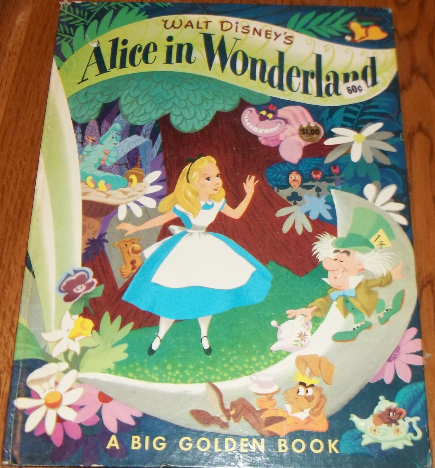 https://static.wikia.nocookie.net/disney/images/b/bc/Alice_in_wonderland_big_golden_book.JPG/revision/latest?cb=20131214005111