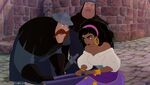 The guards harass Esmeralda