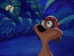 Timon smiling at Pumbaa