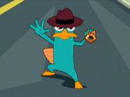 Perry met zijn spionnenbadge