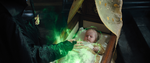 A baby Aurora cursed by Maleficent