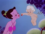 A black-haired centaurette getting lipstick put on