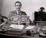 Walt reading a Mickey Mouse comic book.