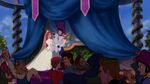 Ariel and Eric are married by the altar.