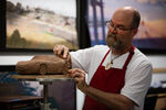 Jerome Ranft working on a sculpture of Cruz Ramirez.